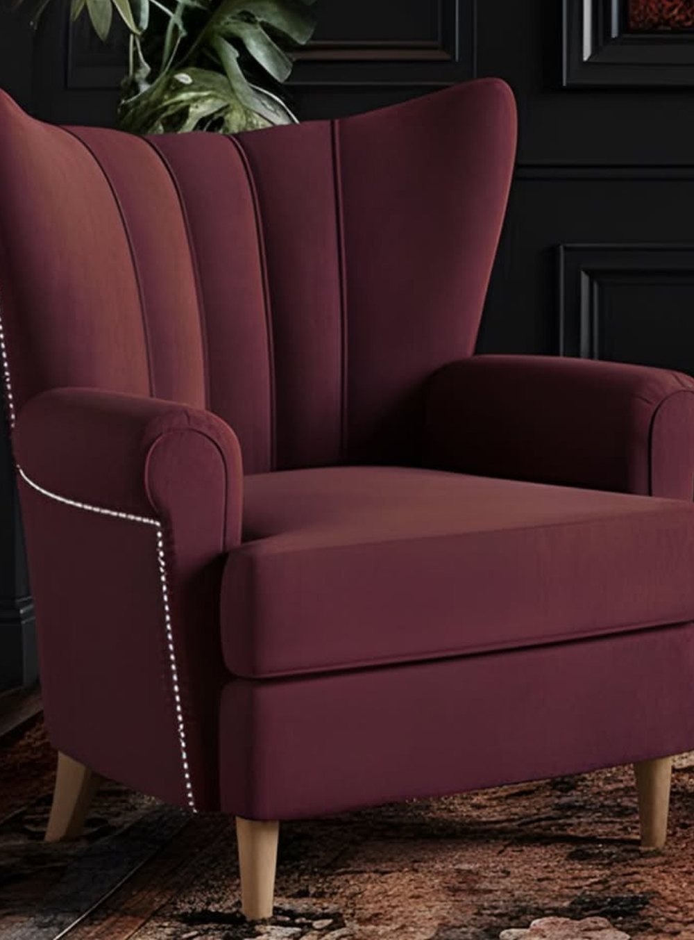 Burgundy channel-back lounge chair with nailhead trim